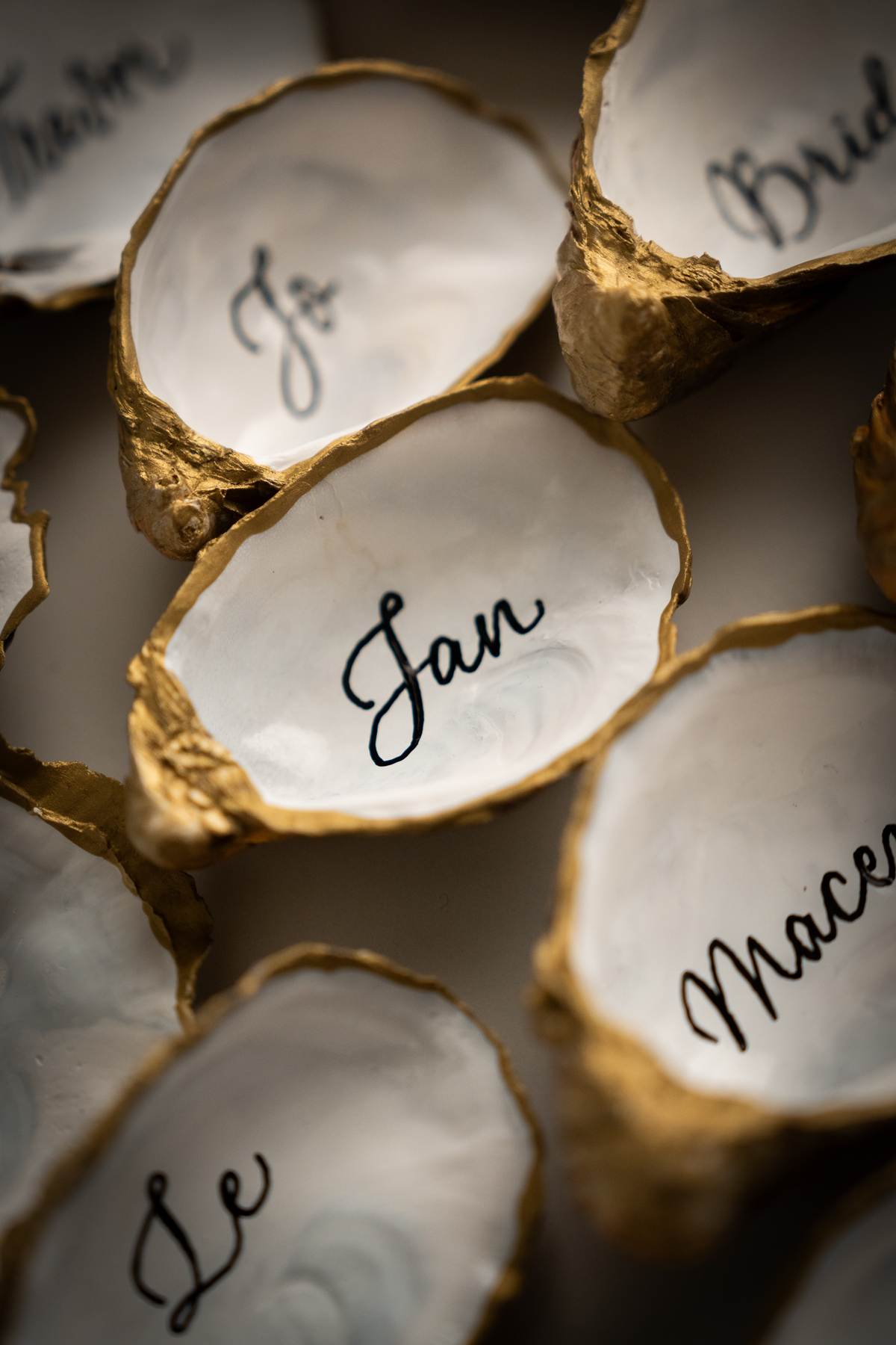 11 Oyster shell modern calligraphy wedding place cards