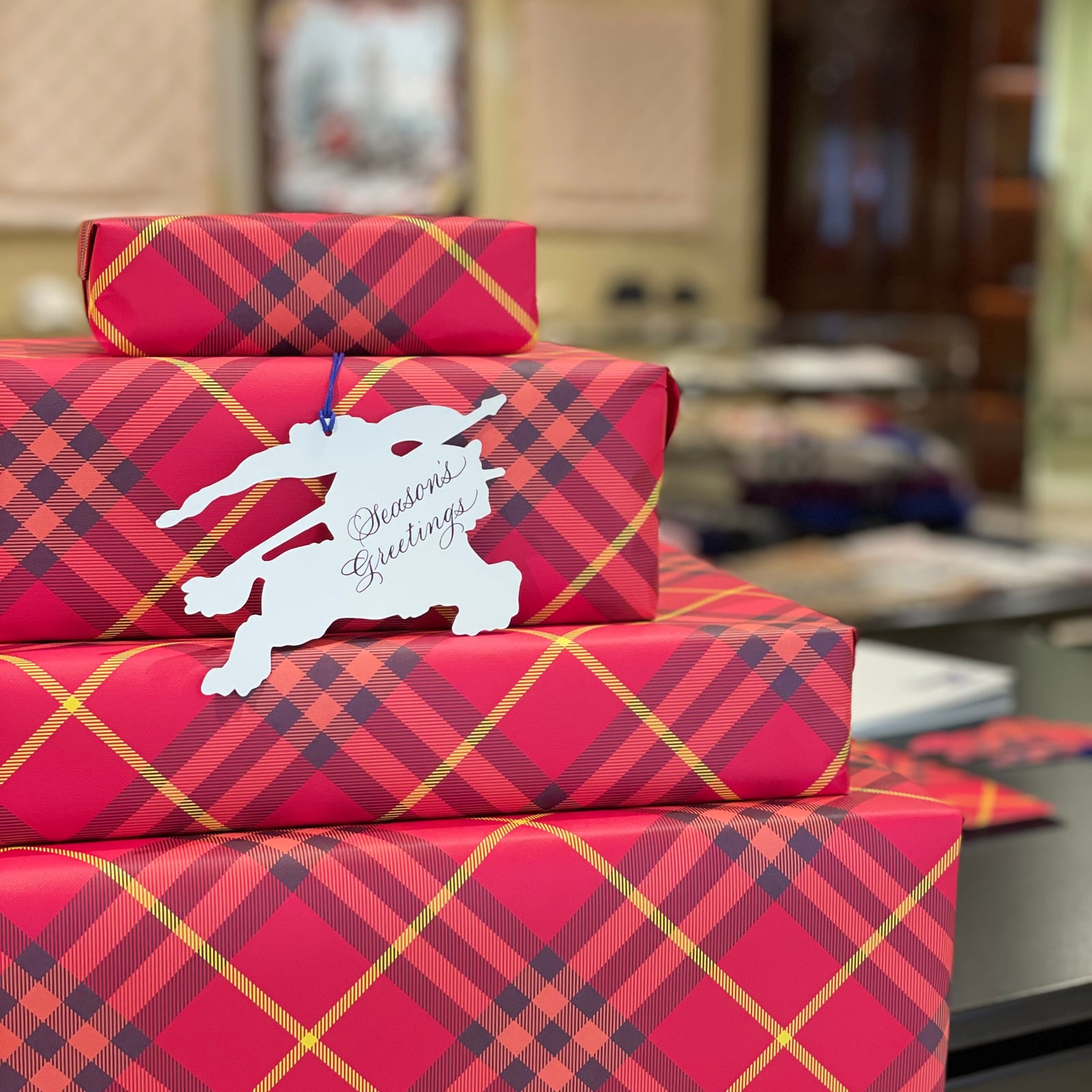 Burberry Christmas gifts finished with a lettered tag