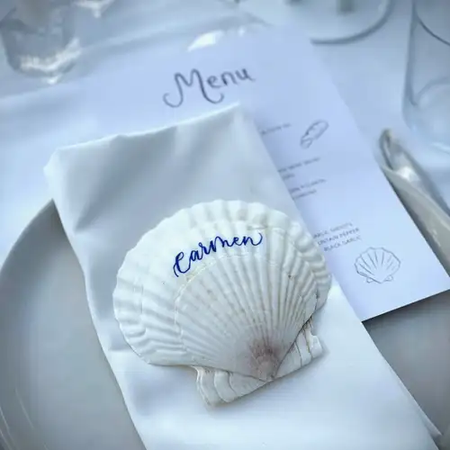 Shell wedding place card calligraphy detail