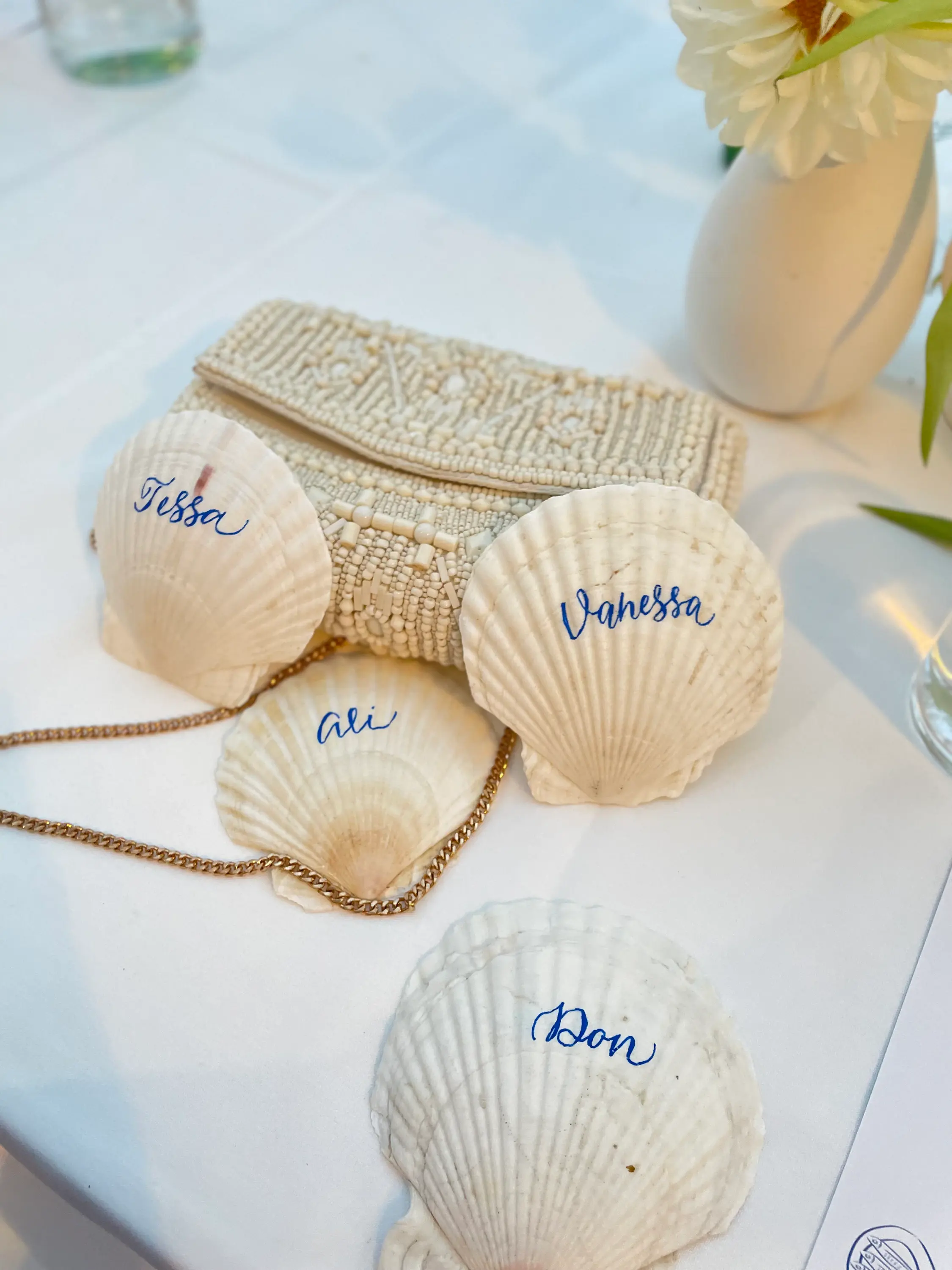 Shell place card calligraphy