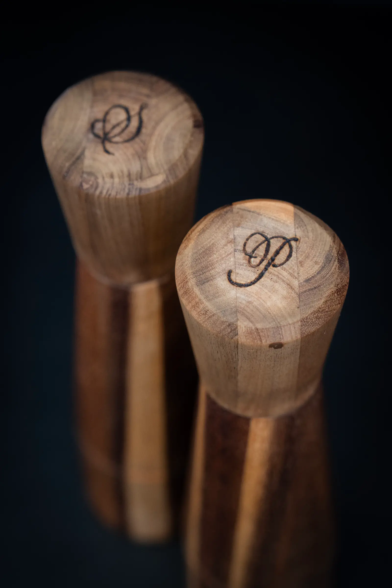 Wood burning pyrography on timber salt and pepper grinders