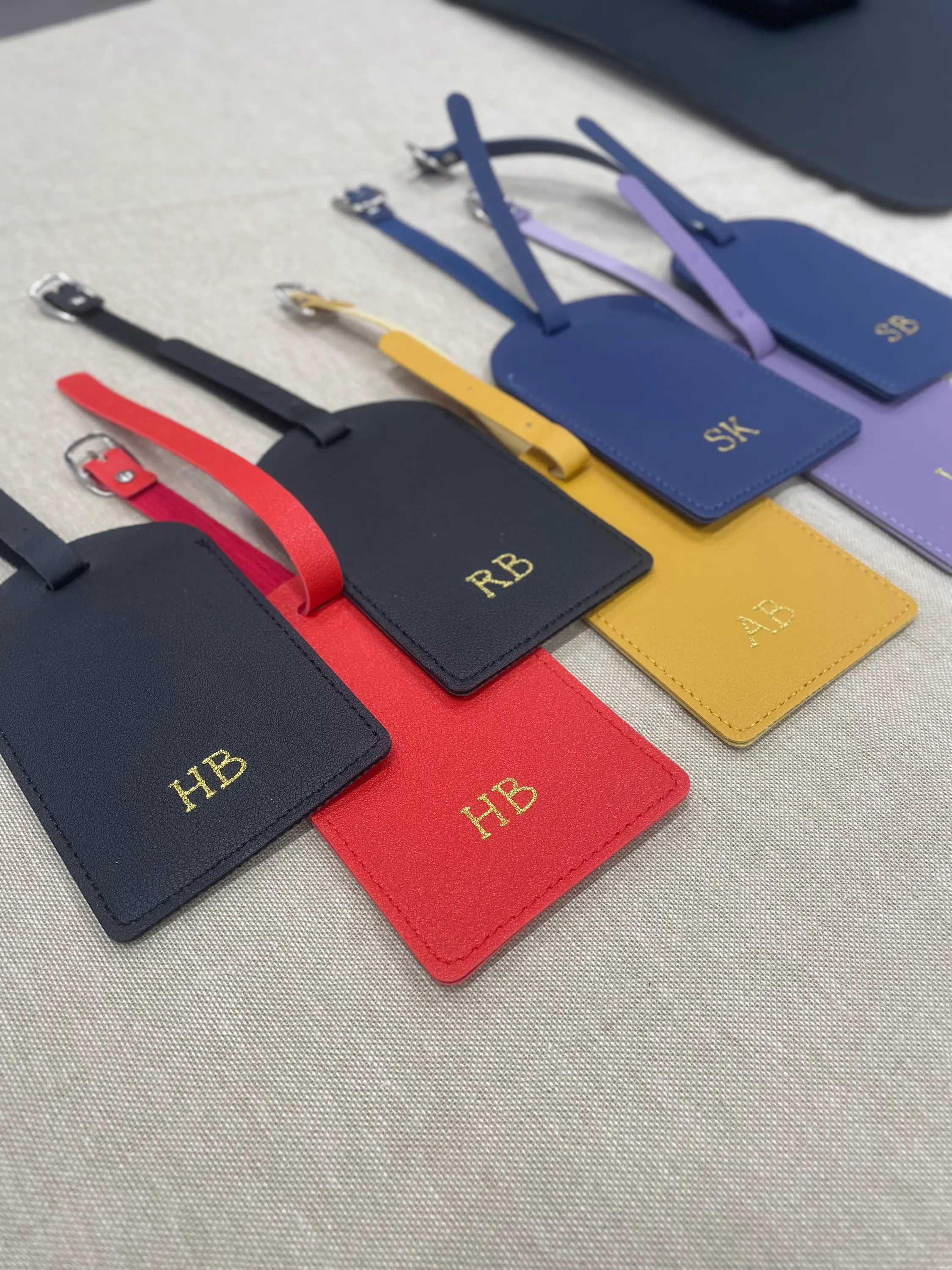 Hot foiled luggage tags, block script