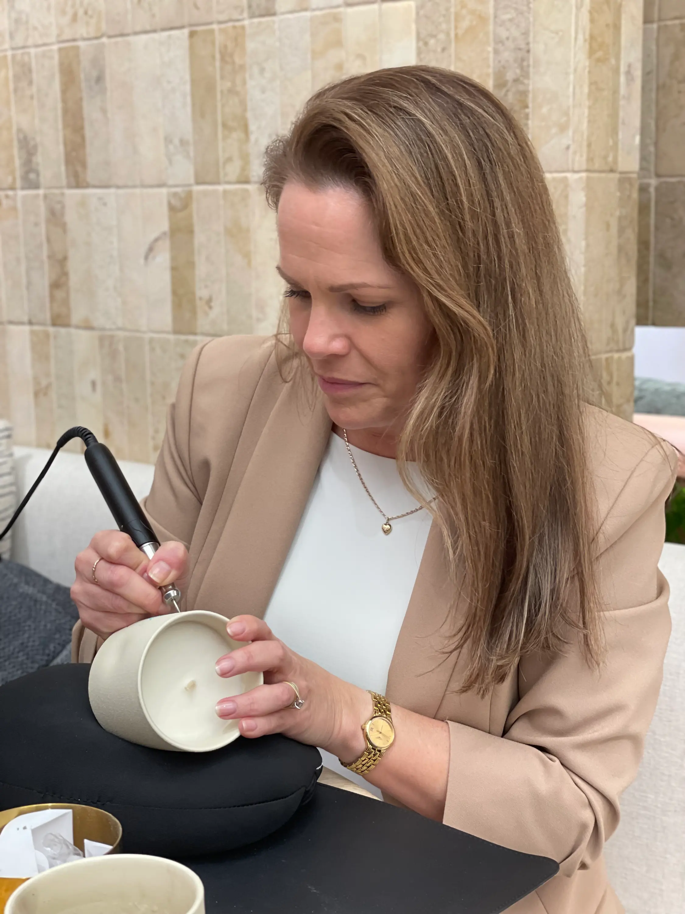 Engraving ceramic candles for Castlery in West End Brisbane